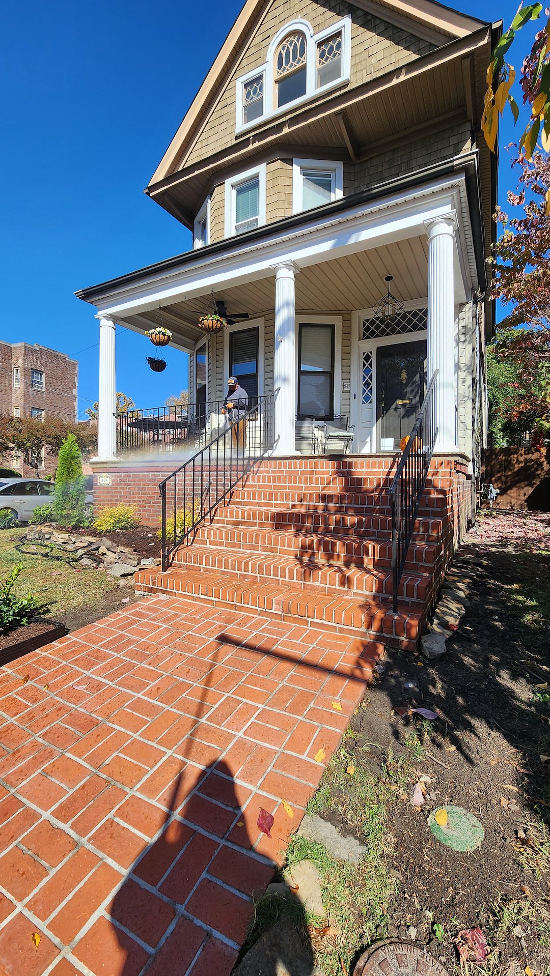Professional residential pressure washing brick steps and porch in Norfolk Va